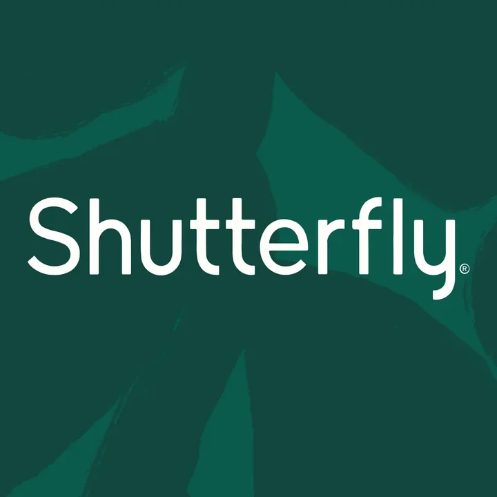 White script wordmark across a deep green botanical backdrop